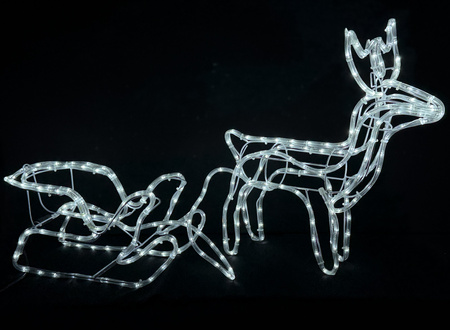 Renifer z saniami LED – Zimny Biały